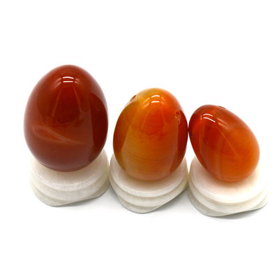 OEM ODM Accepted Red Carnelian Yoni Eggs Semi Precious Stone Eggs Drilled Massage Style
