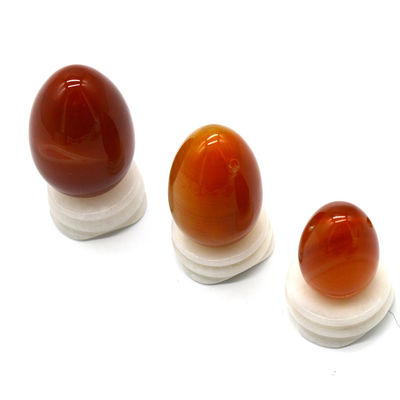 OEM ODM Accepted Red Carnelian Yoni Eggs Semi Precious Stone Eggs Drilled Massage Style