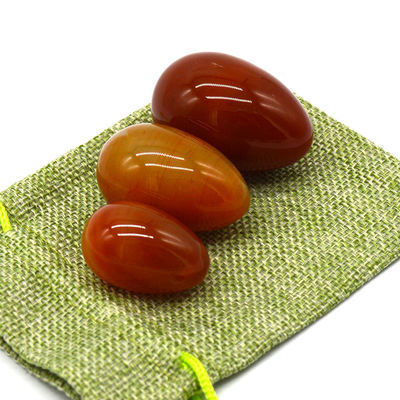 OEM ODM Accepted Red Carnelian Yoni Eggs Semi Precious Stone Eggs Drilled Massage Style