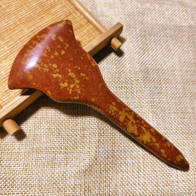 Experience the Healing Benefits of Full-body Massage and Acupoint Stimulation with Red Bian Stone Gua Sha Board