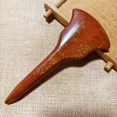 Experience the Healing Benefits of Full-body Massage and Acupoint Stimulation with Red Bian Stone Gua Sha Board