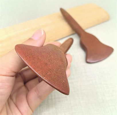 Experience the Healing Benefits of Full-body Massage and Acupoint Stimulation with Red Bian Stone Gua Sha Board