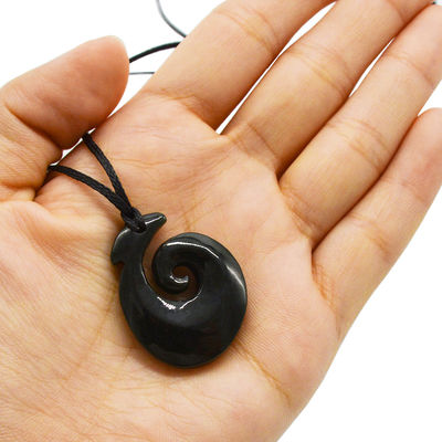 Hook Shaped Nephrite Jade Eternity Twist Pendant with Polished Finish and Zealand Maori Koru Carving