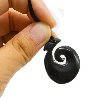 Hook Shaped Nephrite Jade Eternity Twist Pendant with Polished Finish and Zealand Maori Koru Carving