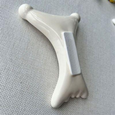 OEM/ODM X Shaped Ceramic Gua Sha Scraping Massager Beauty Salon Essential for Facial Relaxation