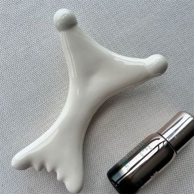 OEM/ODM X Shaped Ceramic Gua Sha Scraping Massager Beauty Salon Essential for Facial Relaxation