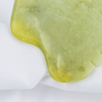 Say Goodbye to Muscle Tension and Hello to Radiant Skin with Xiuyan Jade Gua Sha Scraping Board