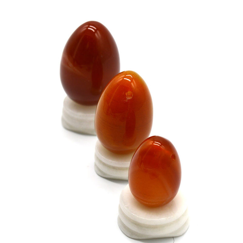 OEM ODM Accepted Red Carnelian Yoni Eggs Semi Precious Stone Eggs Drilled Massage Style