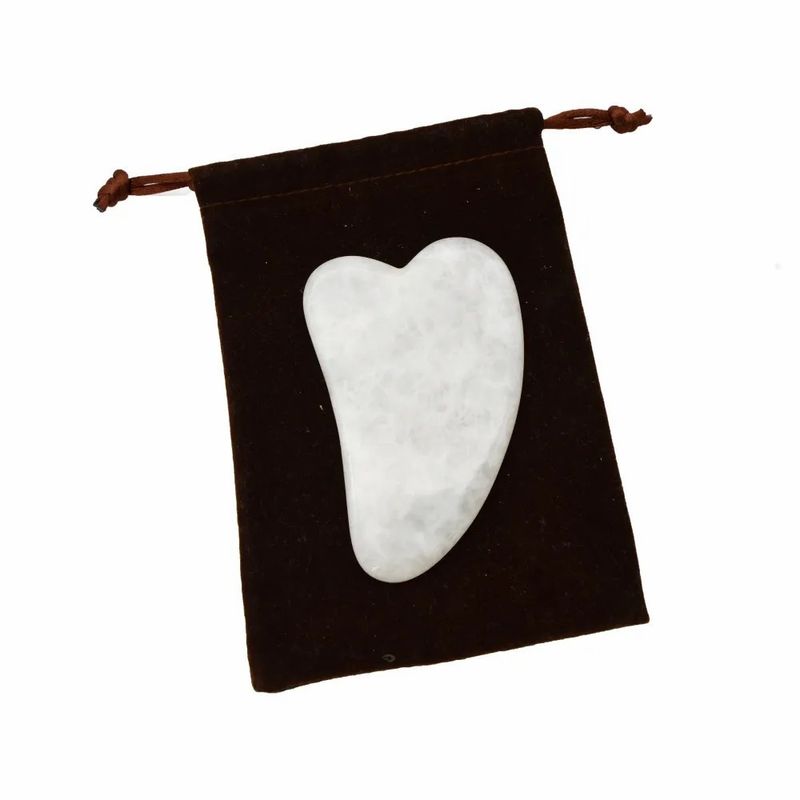 Hand-Held Gua Sha Tool Made of White Jade for Effective Muscle Massage and Beauty Care